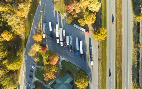 Large truck stop with resting area near busy american interstate freeway